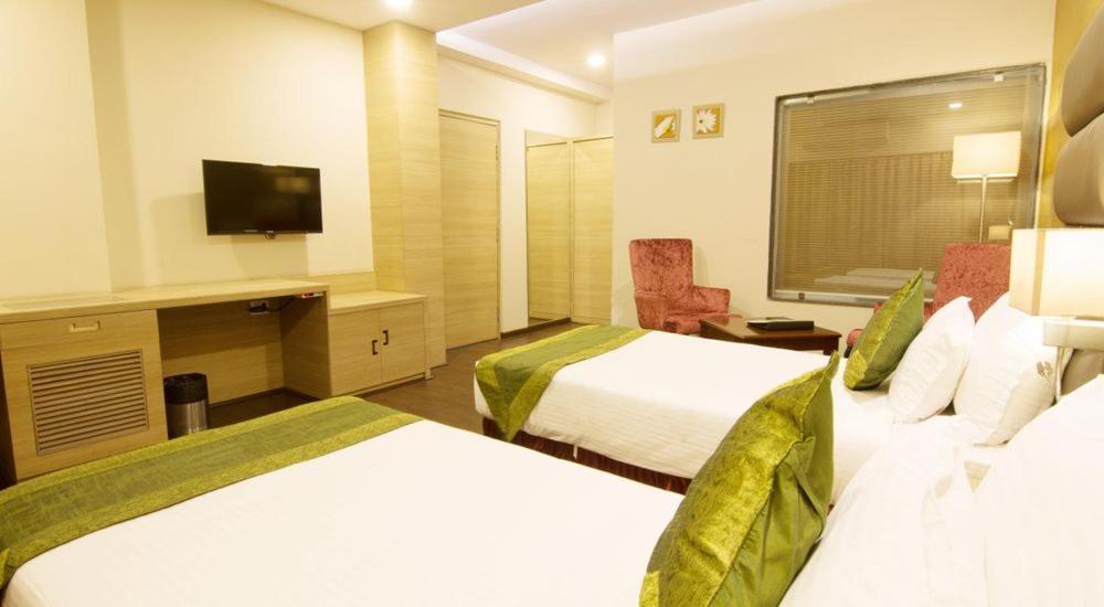 Kc Manor Hotell Jamshedpur Exteriör bild